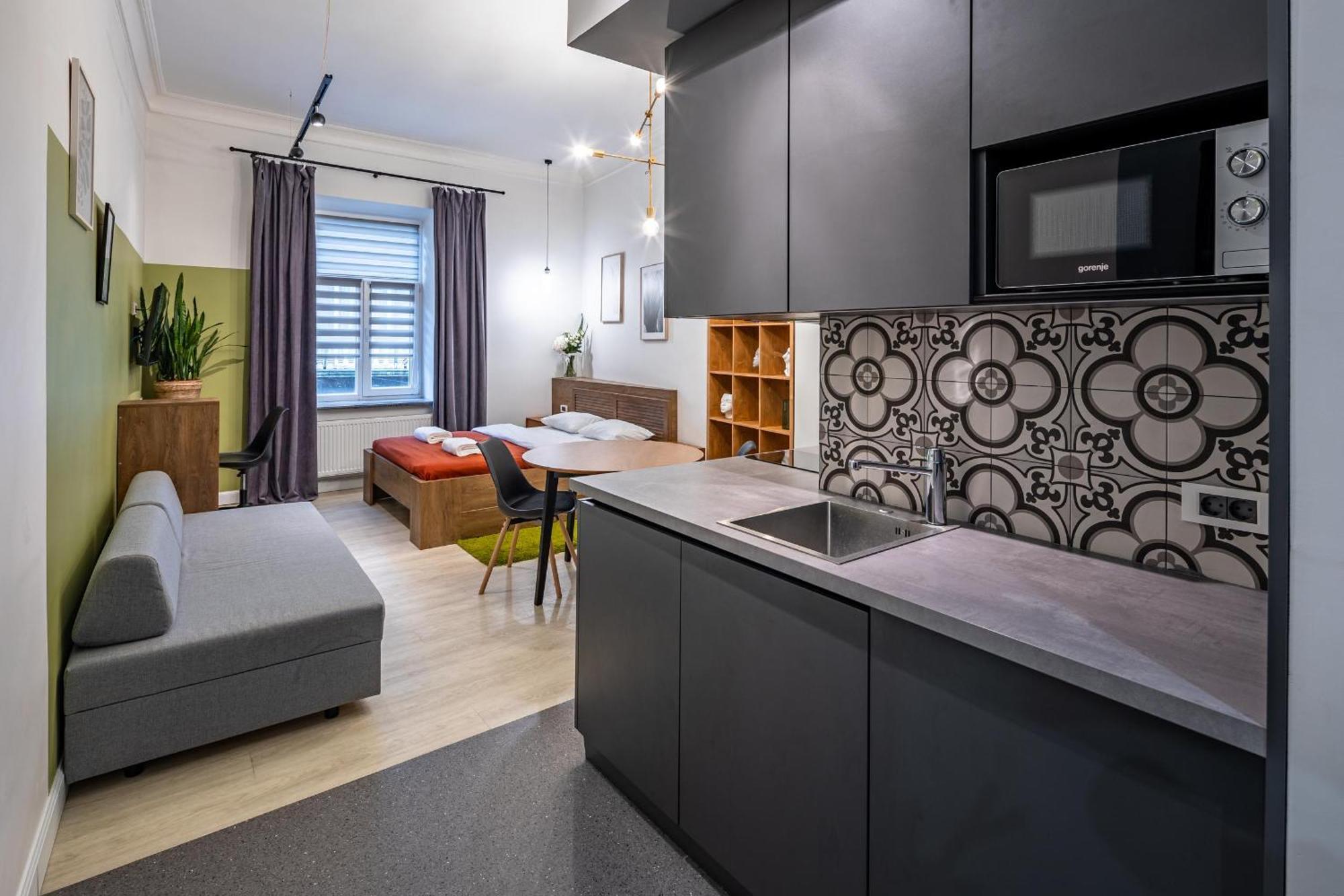 Apartamenty On Knyazya Romana Lviv Bagian luar foto